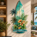 Surfboard-shaped metal wall art with tropical palm tree and ocean scene printed on aluminum for beach house decor